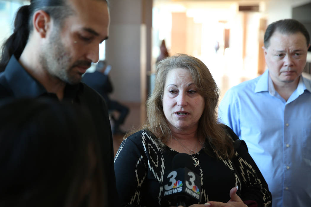 The family of 24-year-old Matthew Christensen from left, older brother Reggie, mother Theresa a ...