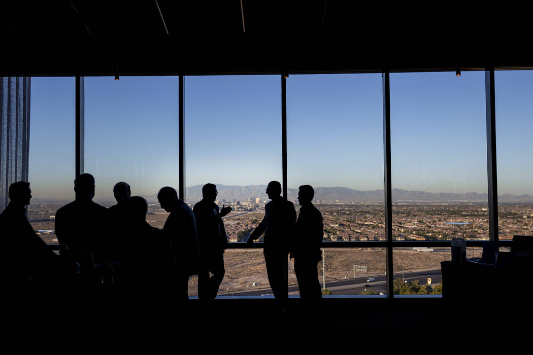 Individual mingle during the project overview for Bleutech Park Las Vegas, the proposed $7.5 bi ...