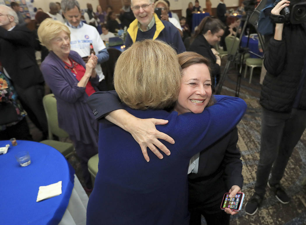 Candidate for the 94th District, Shelly Simonds, celebrates with supporters as election results ...
