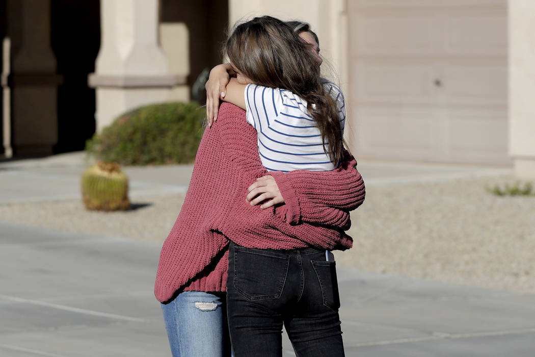 Madelyn Staddon, right, a relative of some of the members of a Mormon community who were attack ...