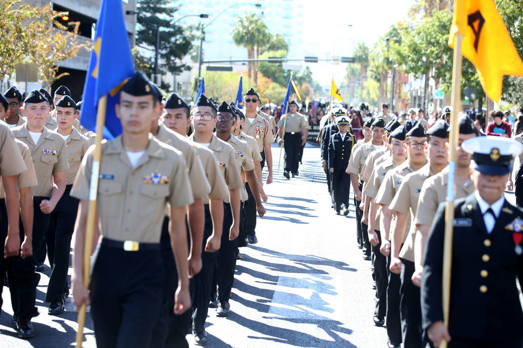 Centennial High School Navy Junior ROTC marches in the Veterans Day Parade in downtown Las Vega ...