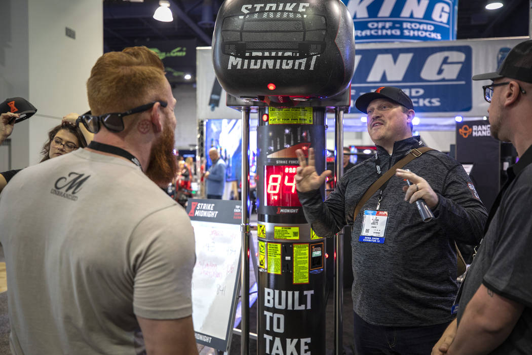 Marketing expert Joe Mattson of Bivalve Agency in Texas is shown with a 200-pound ball that rel ...