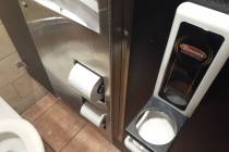 A beverage container in a stall in the men's bathroom at Binion's in downtown Las Vegas. (Tony ...