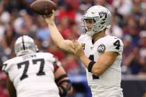 Oakland Raiders quarterback Derek Carr (4) throws the football during the first half of an NFL ...