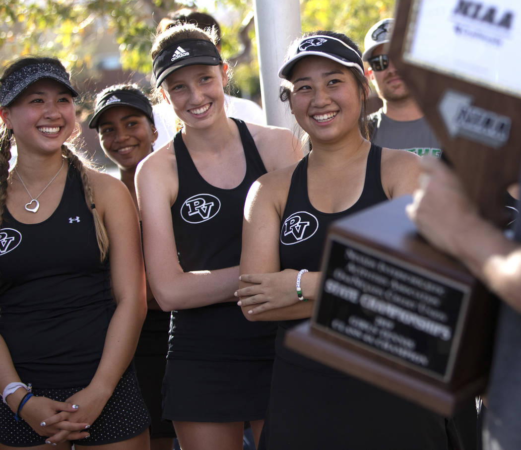 Palo Verde tennis players Mandalay Labarre, left, Caroline Lemcke, center, and Caroline Hsu, ri ...