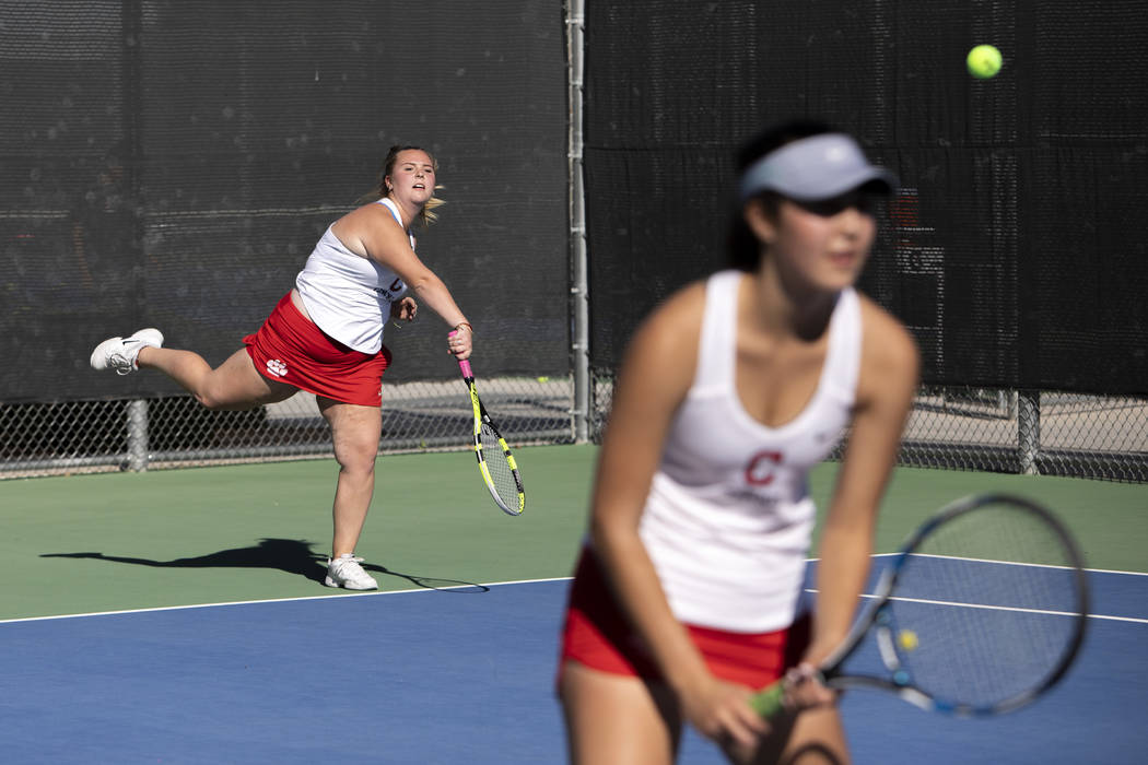 Coronado's Kaylen Heiss serves to Palo Verde on the court with her partner Sidra Wohlwend on We ...