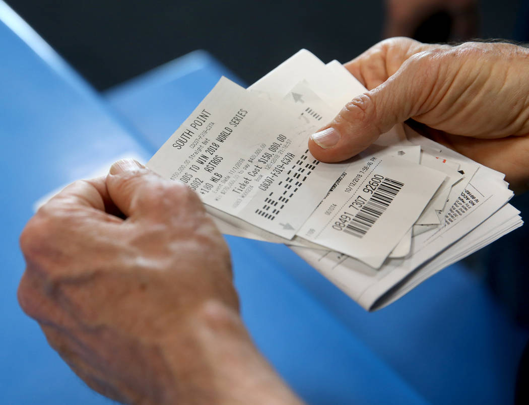 Houston furniture store owner Jim "Mattress Mack" McIngvale, 68, shows betting ticket ...