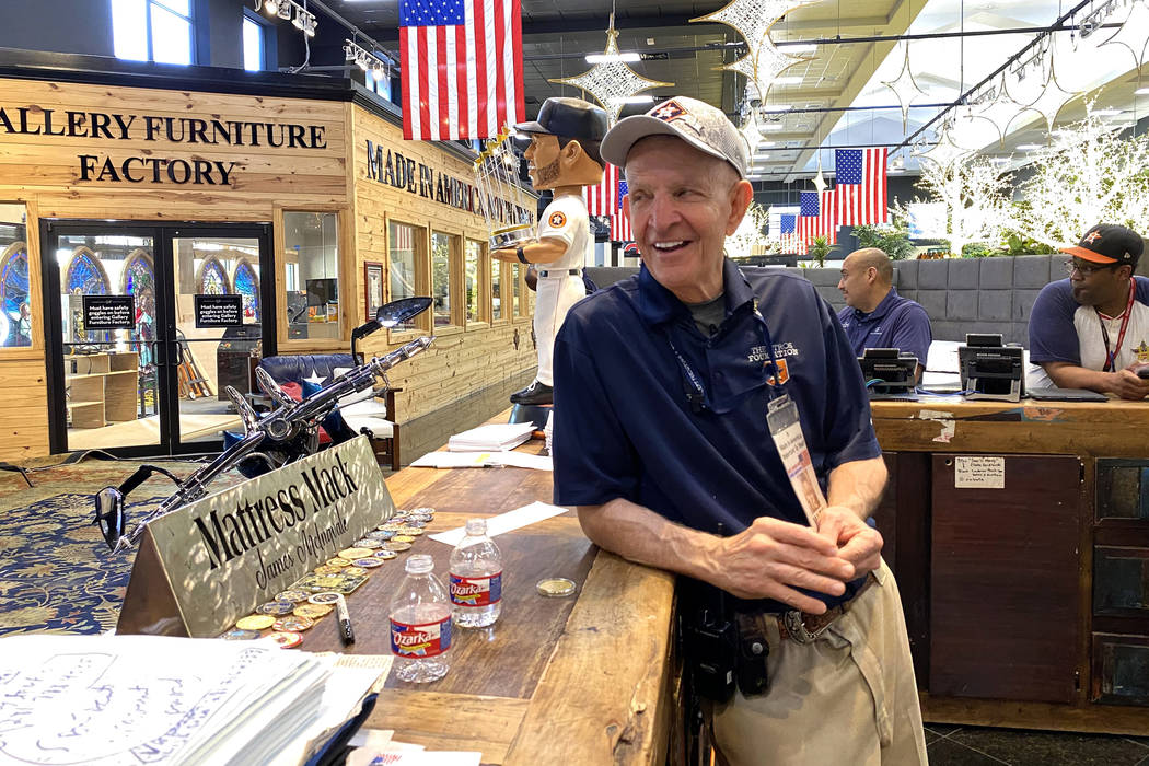 Houston furniture store owner Jim "Mattress Mack" McIngvale, 68, mans the counter in ...