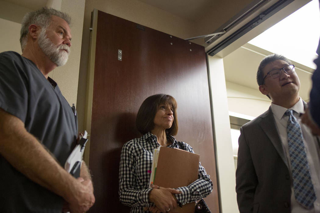 Nevada dental board members Dr. Daniel Kevin Moore, left, consumer member Gabrielle Cioffi, cen ...