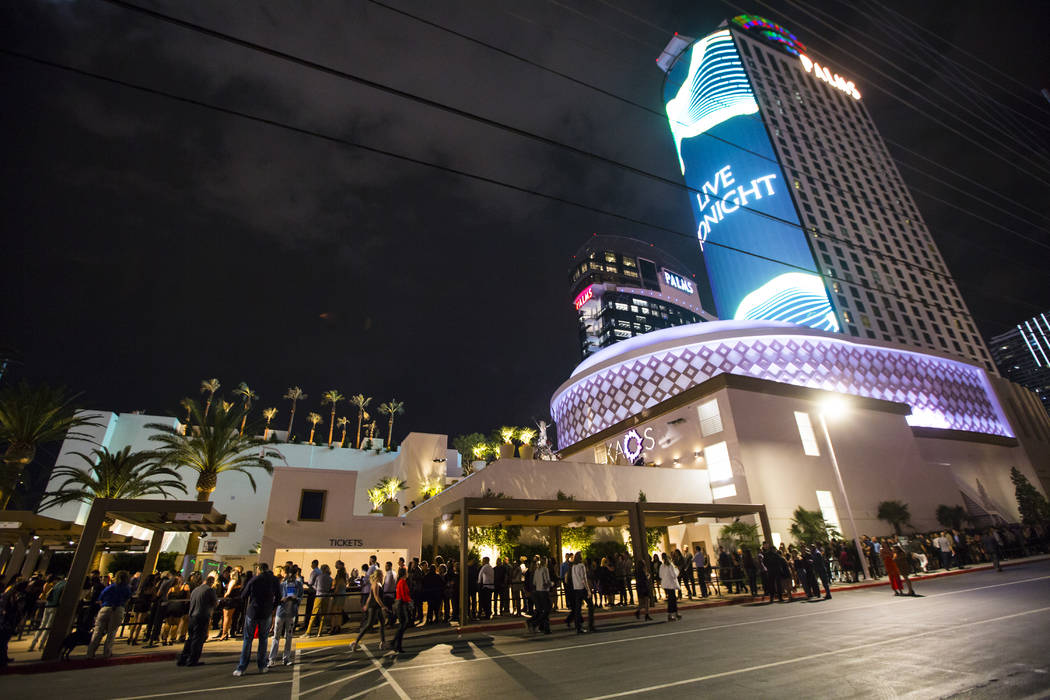 Attendees line up outside of the Palms during the grand opening weekend of Kaos, the new dayclu ...