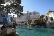 Tourists gather in front of the Bellagio Fountains on the Las Vegas Strip. (Las Vegas Review-Jo ...