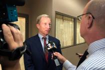Democratic presidential candidate Tom Steyer speaks to reporters before hosting a town hall in ...