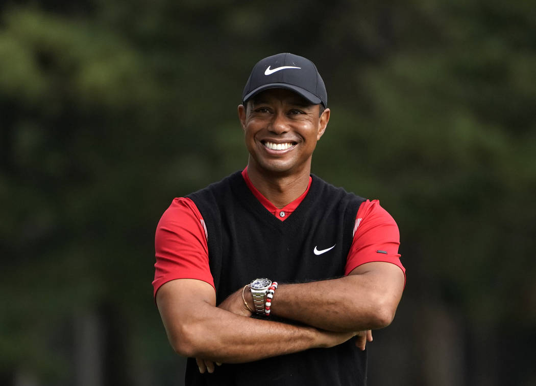 Tiger Woods of the United States smiles during a winner's ceremony after winning the Zozo Champ ...