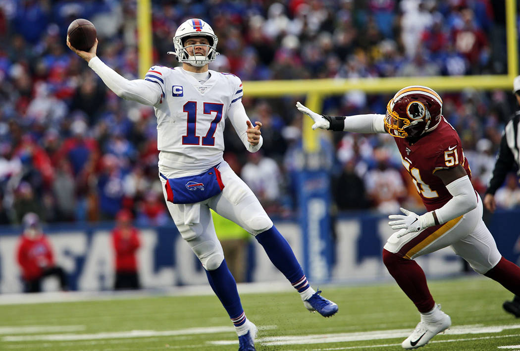 Buffalo Bills quarterback Josh Allen (17) passes against the Washington Redskins during the sec ...