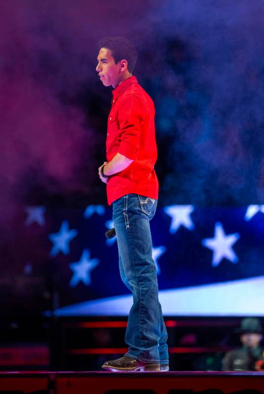 Antonio Moraes sings the National Anthem during the third day of the PBR World Finals at T-Mobi ...