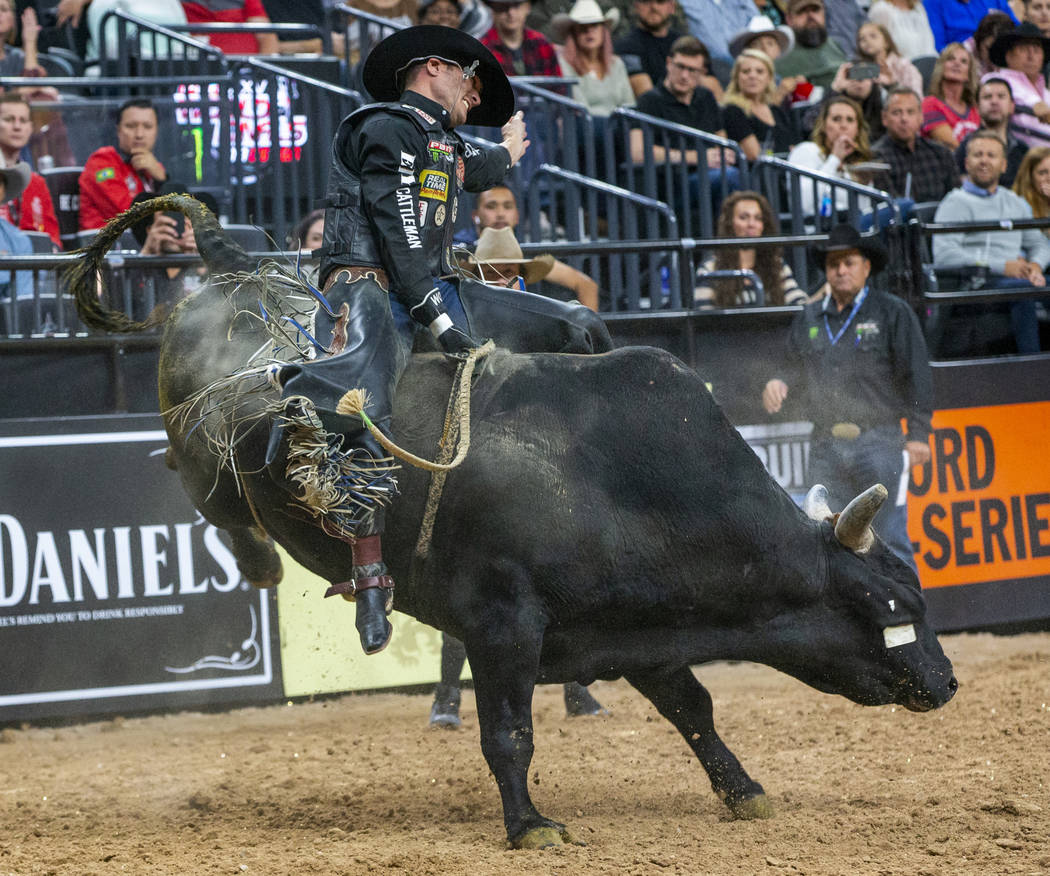 Taylor Toves stays atop Gangster Time during the third day of the PBR World Finals at T-Mobile ...