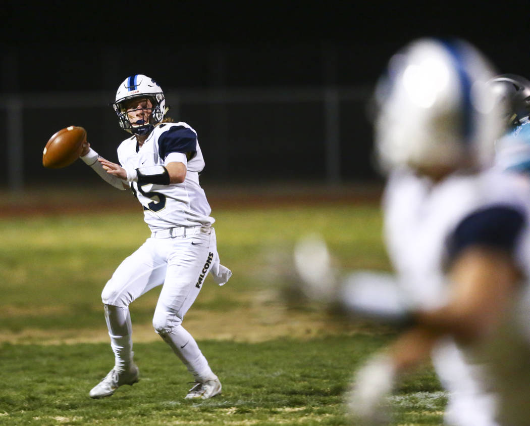 Foothill's quarterback Koy Riggin (15) looks to pass the ball during the second half of a 4A De ...