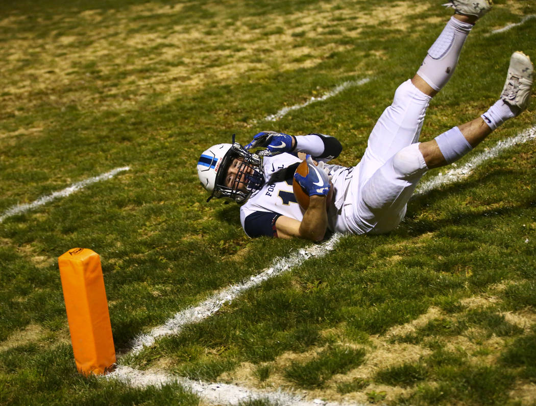 Foothill's Thomas Fisher-Welch (18) catches the ball for a touchdown during the first half of a ...