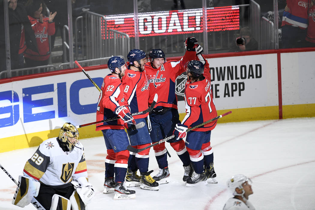 Washington Capitals center Nicklas Backstrom (19), of Sweden, celebrates his goal with right wi ...
