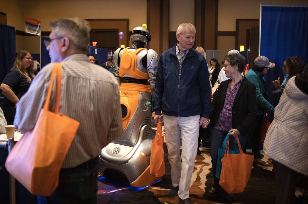 People attend the AgeWell Expo at Red Rock Resort in Las Vegas on Saturday, Nov. 9, 2019.(Ellen ...