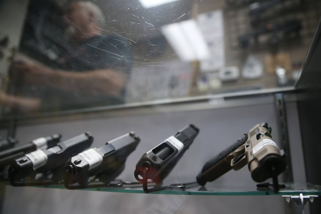 Guns are showcased at 2nd Amendment Gun Shop in Las Vegas, Wednesday, Sept. 4, 2019. (Erik Verd ...