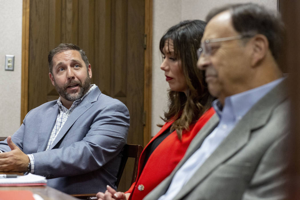 Las Vegas Bowl executive director John Saccenti, left, UNLV athletic director Desiree Reed-Fran ...