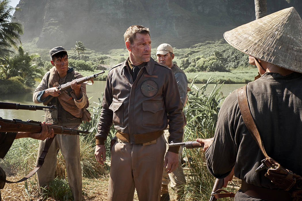 This image released by Lionsgate shows Aaron Eckhart in a scene from "Midway." (Reine ...