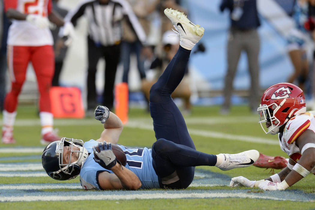 Tennessee Titans wide receiver Adam Humphries (10) scores the winning touchdown against the Kan ...