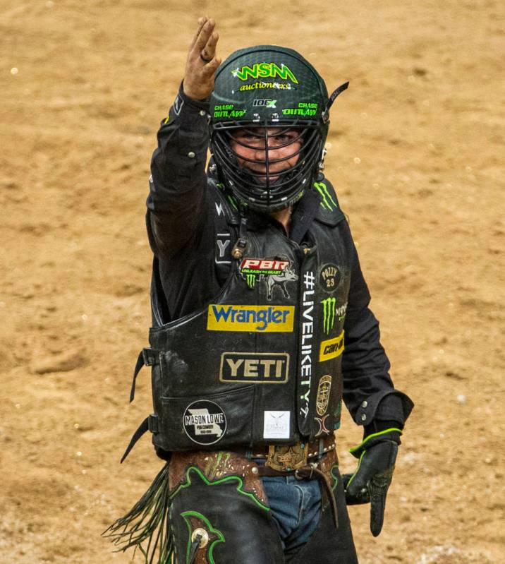 Chase Outlaw is pumped after a successful ride atop of Big Black during the last day of the PBR ...
