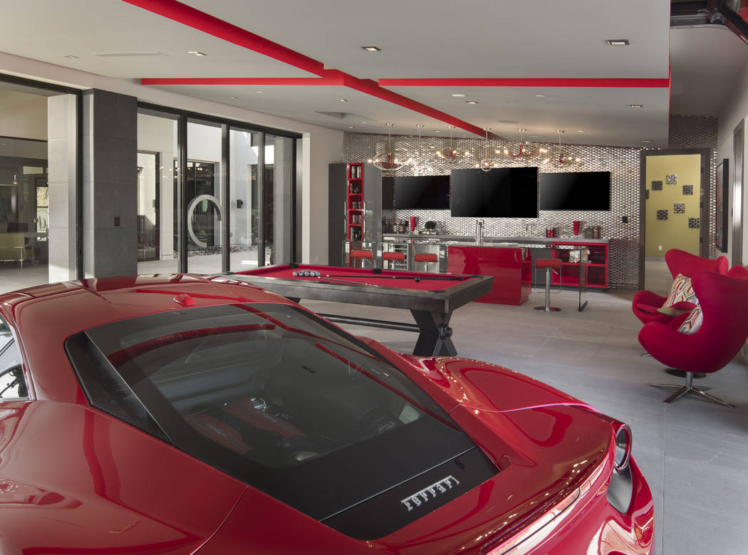 The 2019 New American Home has a garage that doubles as an air-conditioned man cave with a pool ...