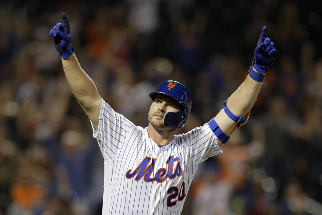 FILE - In this Sept. 28, 2019, file photo, New York Mets' Pete Alonso reacts after hitting a ho ...