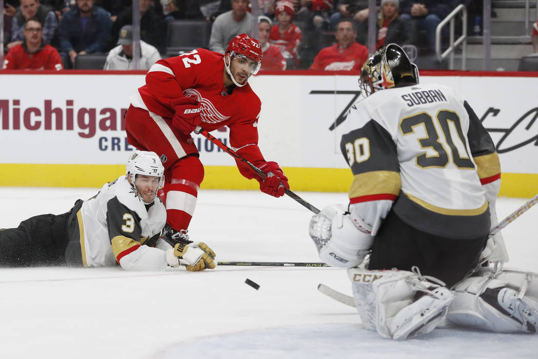 Vegas Golden Knights goaltender Malcolm Subban (30) deflects a shot by Detroit Red Wings center ...