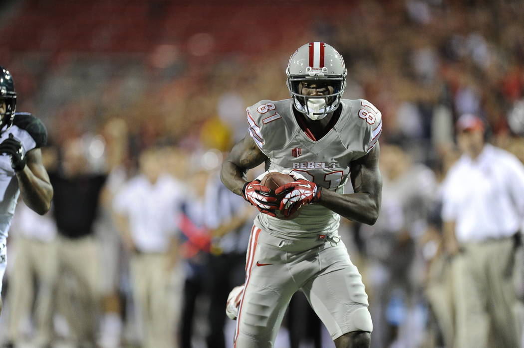 UNLV wide receiver Devante Davis catches a pass in the Rebels' 39-37 victory on October 12, 201 ...