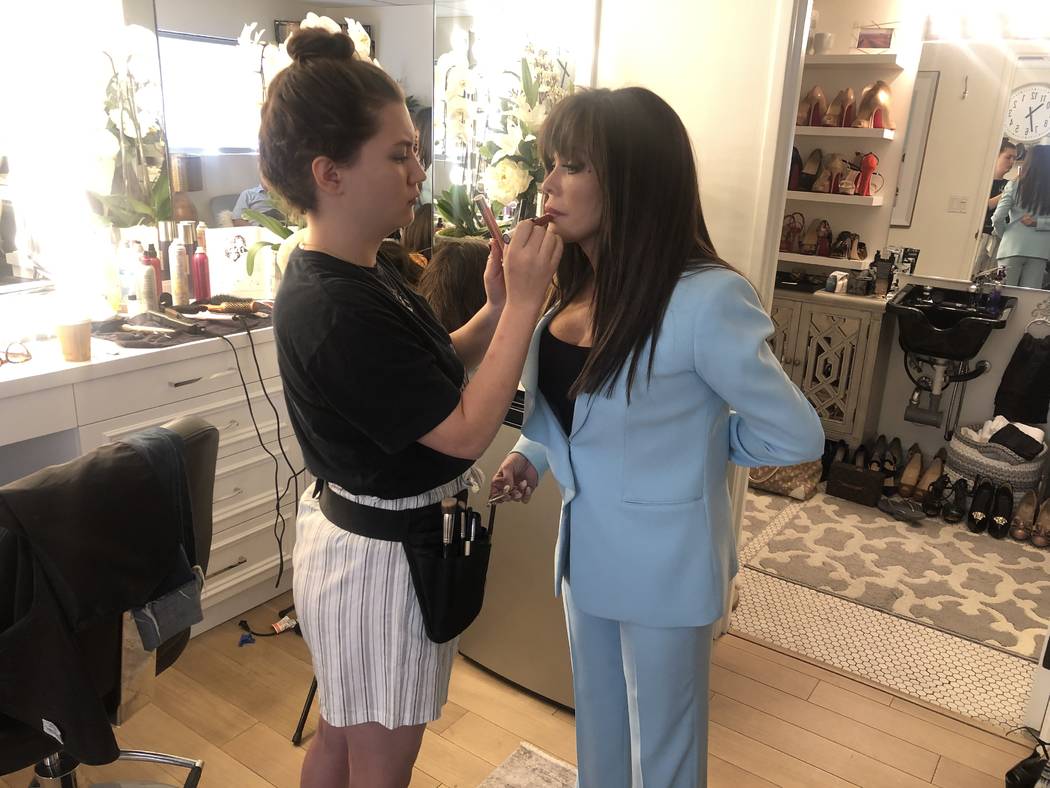 Marie Osmond's daughter, Brianna, applies makeup before a taping of the CBS daytime show "The T ...