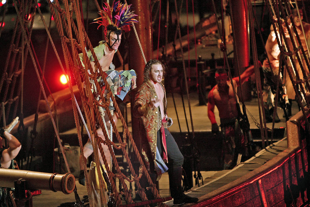 Pirates Nicholas Baker, left, and Rhett Noseck prepare to board the sirens' ship in a performan ...