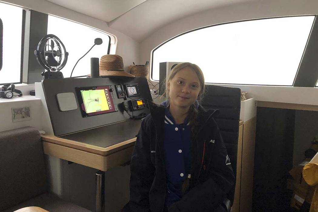 Greta Thunberg, a 16-year-old climate activist from Sweden, sits on a catamaran docked in Hampt ...