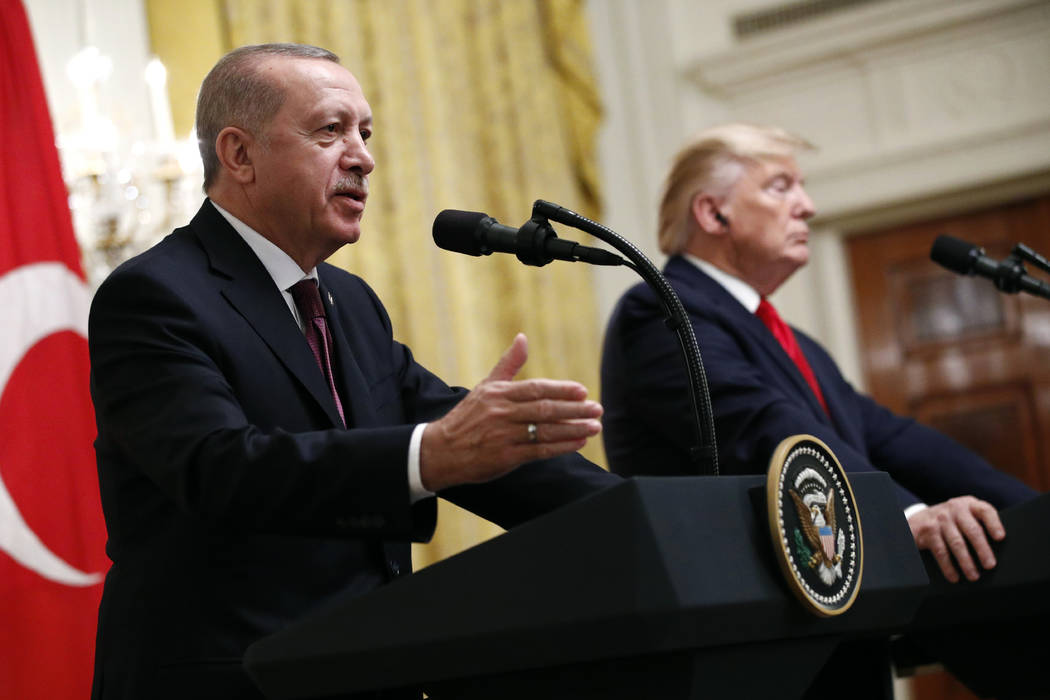 Turkish President Recep Tayyip Erdogan speaks at a news conference alongside President Donald T ...