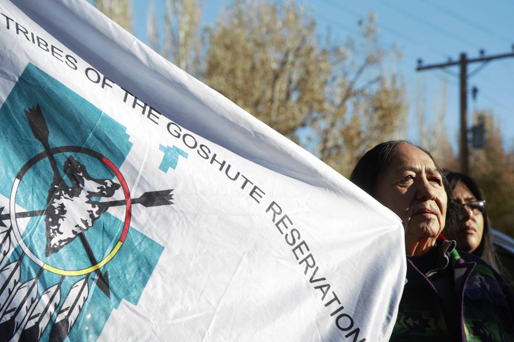 Delaine Spilsbury, an elder of the Ely Shoshone tribe, holds up a Confederated Tribes of Goshut ...