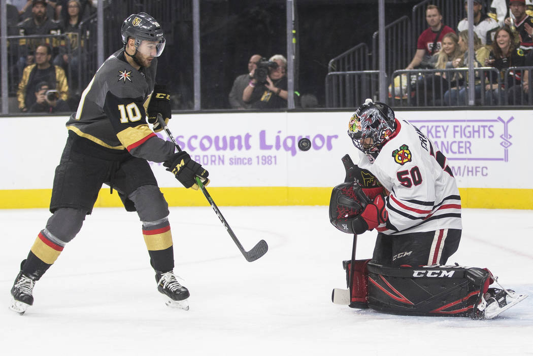 Vegas Golden Knights Center Nicolas Roy (10) shoots on Chicago Blackhawks goaltender Corey Craw ...