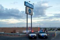 An Aug. 3, 2019, file photo, shows Texas state police cars blocking access to the Walmart store ...