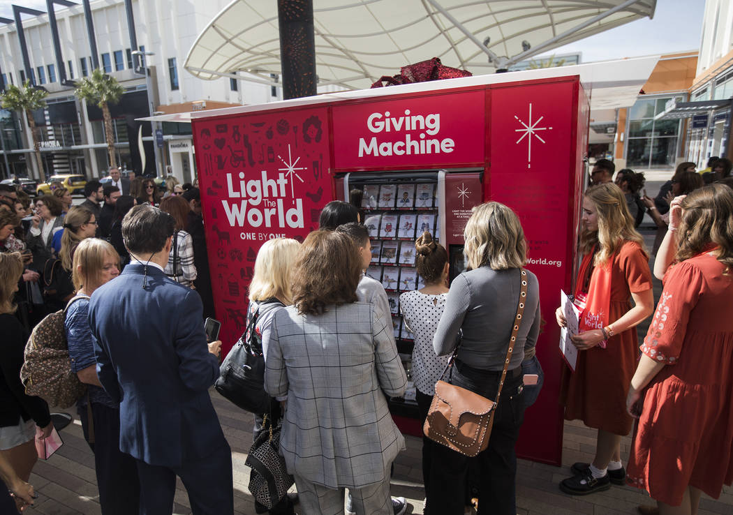 The Giving Machine, a vending machine that offers different items from charities a user can sel ...