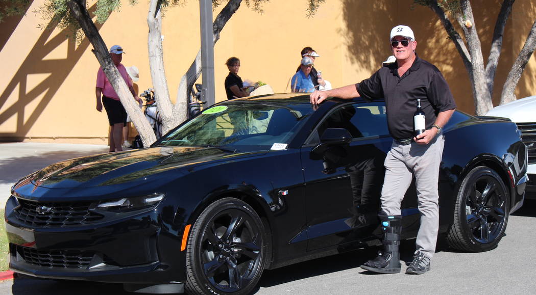 Jeff Henshaw was the winner of the first-ever hole-in-one grand prize, a Chevrolet Camaro spons ...