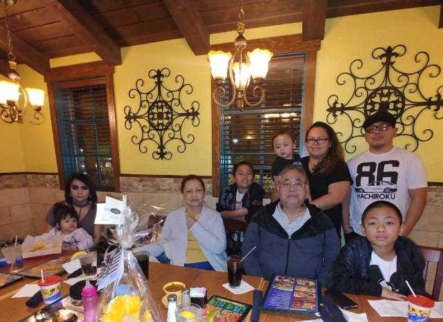 Marcial Escobia, center, is pictured with loved ones. (Photo courtesy Escobia family)