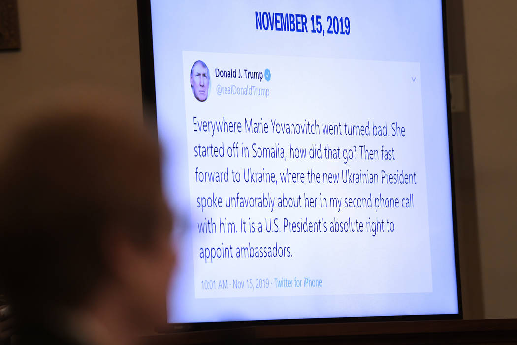 A tweet from President Donald Trump is displayed on a monitor as former U.S. Ambassador to Ukra ...