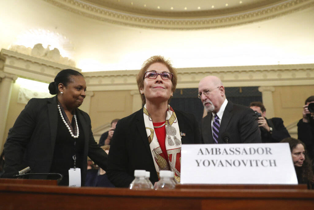Former U.S. Ambassador to Ukraine Marie Yovanovitch, center, arrives to testify to the House In ...