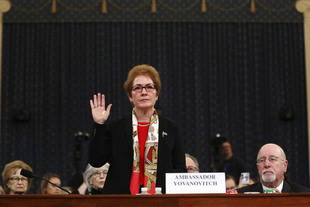 Former U.S. Ambassador to Ukraine Marie Yovanovitch is sworn in to testify to the House Intelli ...