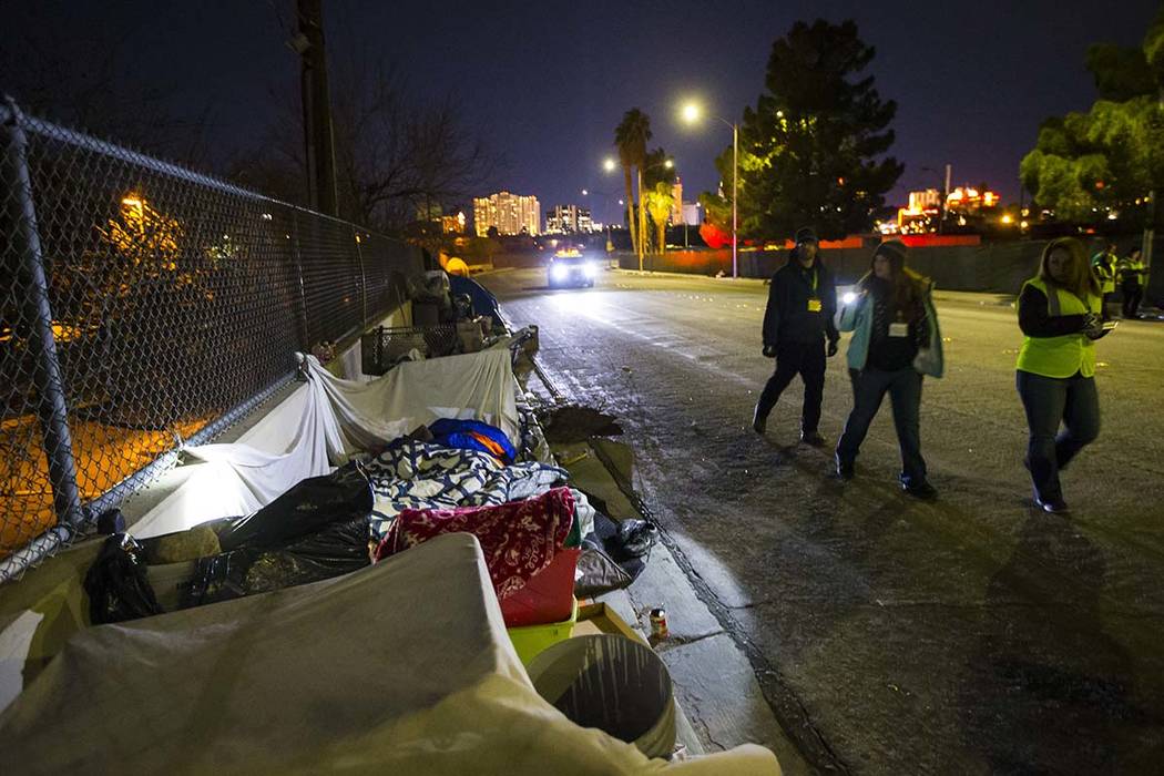 Volunteers find homeless people along Veterans Memorial Drive during the annual Southern Nevada ...