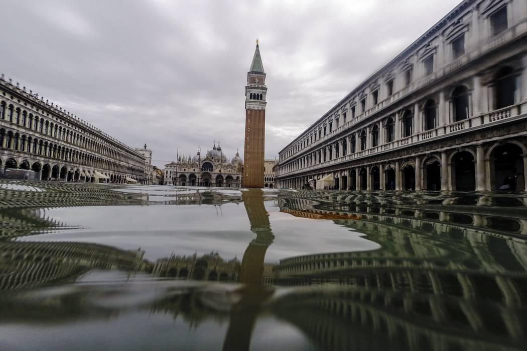 A flooded St. Mark's Square in Venice, Italy, Friday, Nov. 15, 2019. Waters are rising in Venic ...
