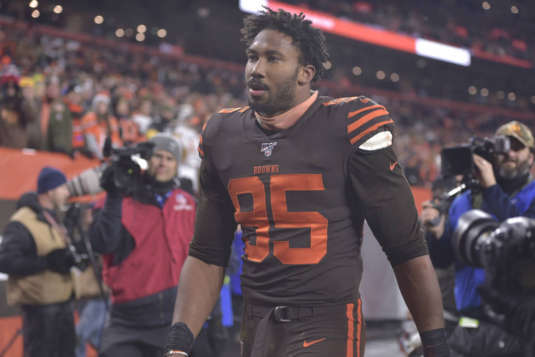 Cleveland Browns defensive end Myles Garrett walks off the field after he was ejected late in t ...