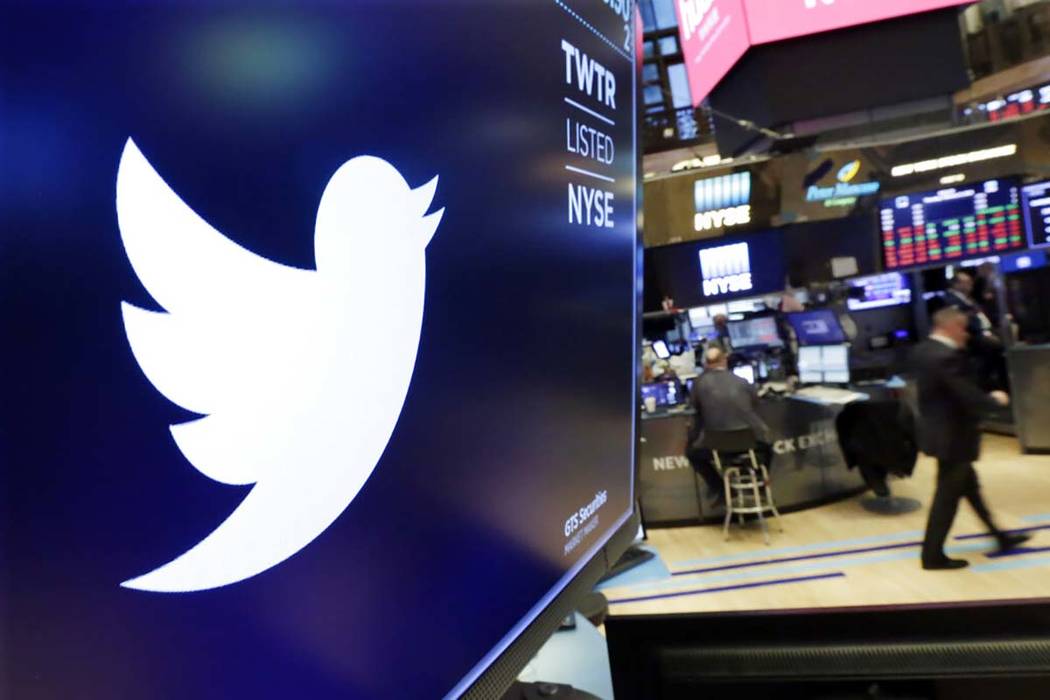 In a Feb. 8, 2018, file photo, the logo for Twitter is displayed above a trading post on the fl ...